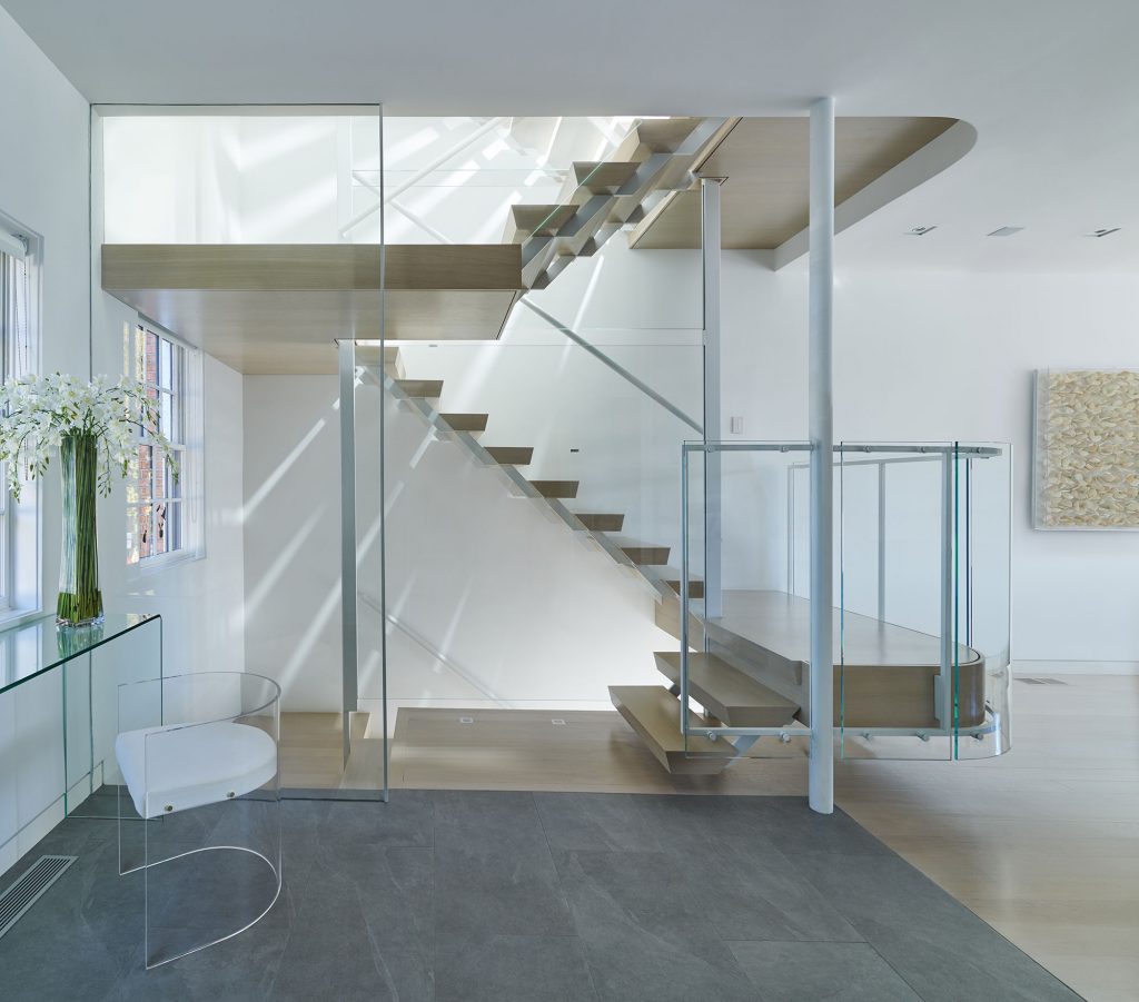 Central to this recently gutted condominium is a highly detailed stair. Winner of a 2020 AIA DC/Washington Residential Award, it replaced the original tight winding stair and connects all levels, both functionally and architecturally.
