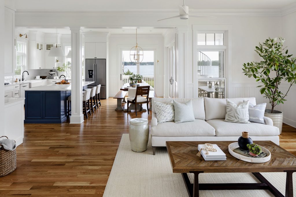 Columns, custom millwork, and high ceilings ground this beach house in tradition.