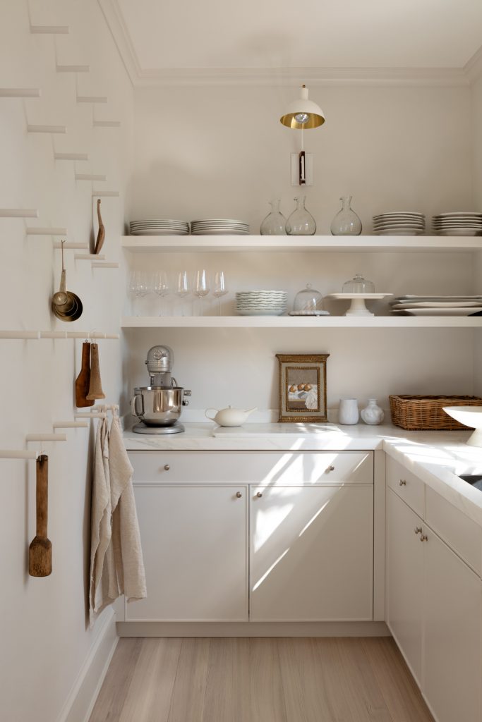 White lets small details like the  handles on the cabinetry stand out.