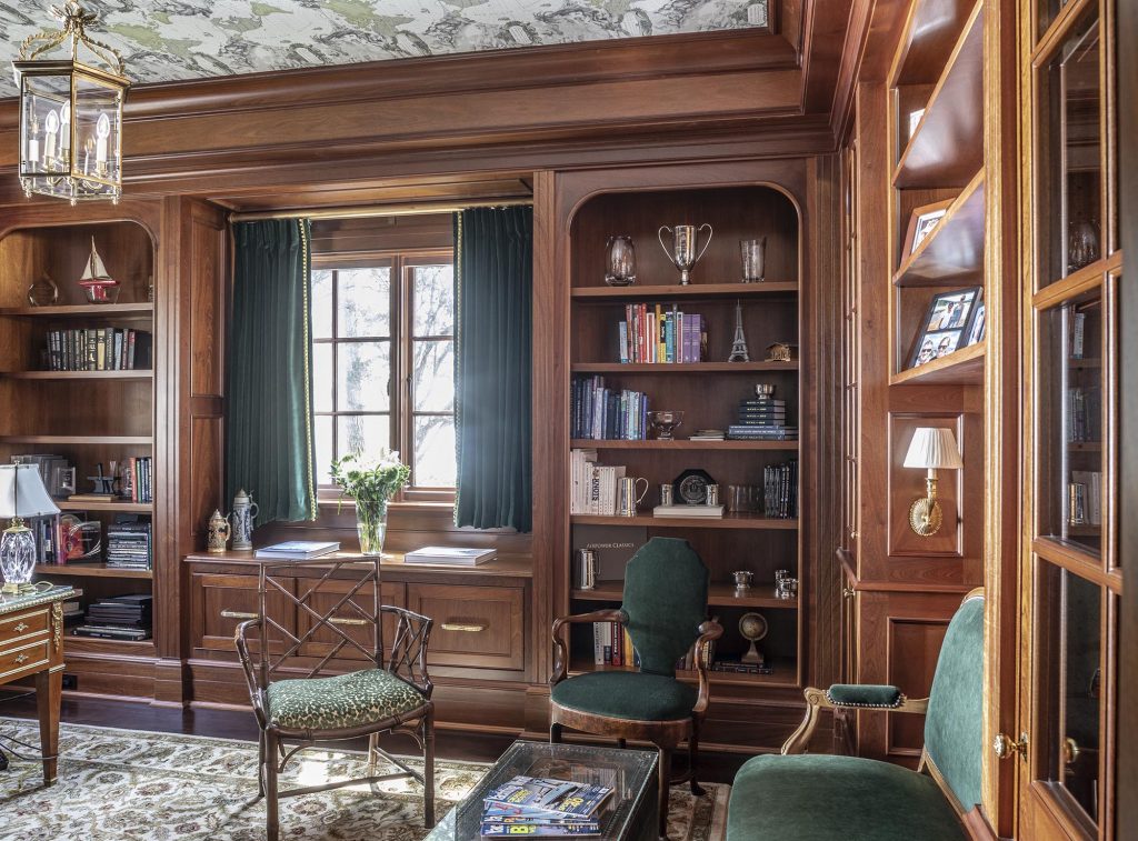 The dark-paneled office is Bob’s domain and composed of custom-made cabinetry by Donald Bayne, designed by Catherine Lowe in conversation with the homeowners.