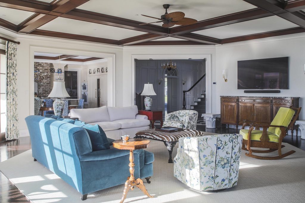 The zebra-covered ottoman and barrel chairs are vintage finds; each item in this room, including the heirloom rocker, is a conversation piece, with a story of some kind.