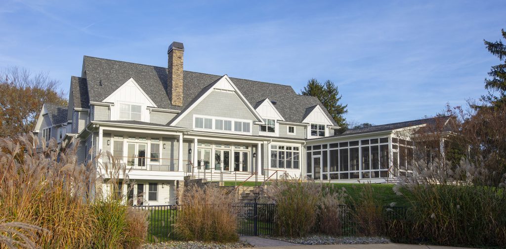 The 8,500-square-foot, two-story home overlooks more than two acres of rolling green yard.