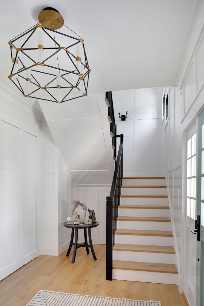 The homeowner did not want  a “beachy” or “cottagey” aesthetic, so chose modern light fixtures  for all of the spaces.  
