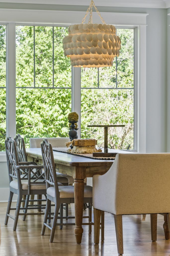 Natural light from the tall windows creates different experiences during different times of day.